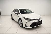 Toyota Corolla Hybride 1.8L Édition Elite Automatique Berline d'occasion 2023 Volant à Gauche Pneus R16 Feux LED Toit Ouvrant Fonctions Intelligentes Euro VI 5