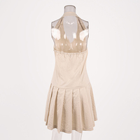 Nouvelle arrivée : robe courte sans manches en kaki pour femmes, col halter, col en V, ceinture à la taille, jupe plissée pour un usage quotidien décontracté