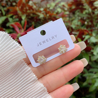 À la mode cuivre plaqué or 18 carats diamant intégré Zircon fleur série boucles d'oreilles plusieurs Styles femmes vêtements quotidiens cadeaux