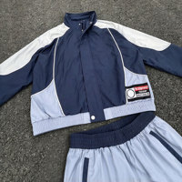 Ensemble de survêtement coupe-vent en nylon avec veste zippée à coutures personnalisées et pantalon ample en nylon, fabriqué sur mesure