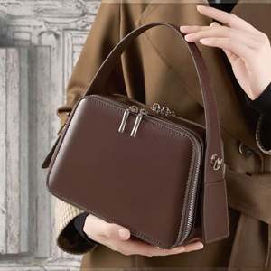 Sac seau à bandoulière en tissu tissé avec cordon de serrage, sensation haut de gamme, sac à main à une épaule, nouveau sac à la mode pour femmes - Product Image 3