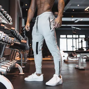 Pantalones informales con cremallera para hombre, ropa deportiva con bolsillos, ajustados, para gimnasio