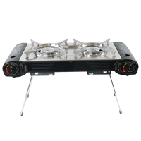 Haute qualité Portable Double brûleur à gaz Butane cuisinière Mini fonte Camping table de cuisson pour une utilisation en voiture Offre Spéciale cuisinière à gaz Portable