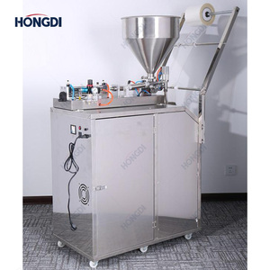 Máquina automática de envasado vertical con tolva de calentamiento y llenadora de líquidos de alta precisión para salsa de soja, cosméticos, alimentos, bolsas y film. - Product Image 6