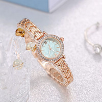 Montre à quartz en métal doré, cadran délicat, face en nacre, pour femme, vente en gros d'usine, best-seller TikTok Live
