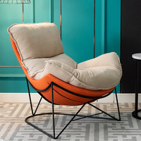 Fauteuil à bascule simple et moderne en métal pour balcon et salon, idéal pour les loisirs estivaux