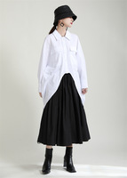 Petit détail français pour femmes, chemise d'automne 2023 nouvelle chemise courte irrégulière Simple Silhouette ample à manches longues pour femmes