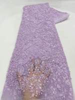 Tissu en dentelle brodée florale colorée avec des paillettes perlées, tissu de vêtement élégant et luxueux