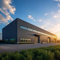 Structure en acier Q355B : Solution d'entrepôt à grande portée de 50 m avec conception d'ingénierie 3D gratuite pour une livraison rapide de projets à l'étranger