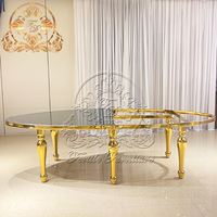 Nouveau modèle de table à manger de forme ovale en verre avec cadre en acier inoxydable et miroir pour événement de mariage ensemble de chaises