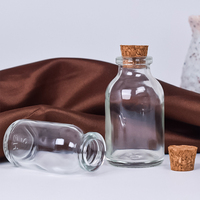 Vente en gros de 10ml 20ml 30ml 50ml 100ml couvercle en liège en bois rond transparent bouteille en verre vide pour pouding/thé/sauces