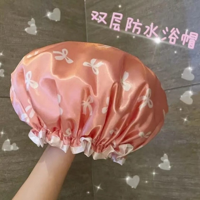Pink shower cap with bow