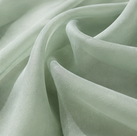 Tissu en mousseline recyclée 100 % polyester léger et transparent, tissu sergé à mémoire de forme, disponible en stock pour la production de vêtements en gros
