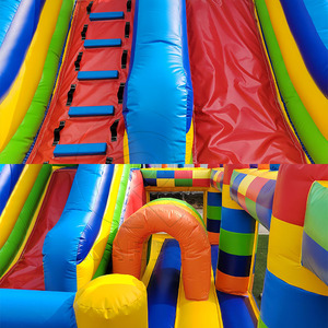 Château gonflable modulaire coloré avec <span class=keywords><strong>tours</strong></span> cylindriques et toboggan intégré pour les enfants, idéal pour les jeux en plein air et les festivals - Product Image 6