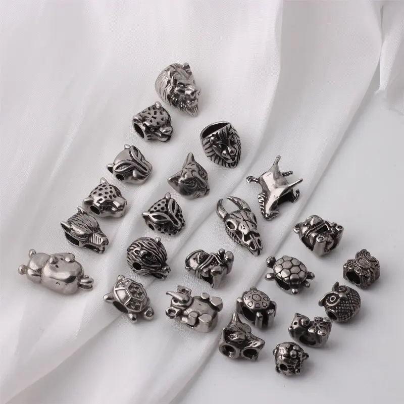 Perles de charme d'espacement de tête d'animal en acier inoxydable personnalisées plusieurs modèles de perles de curseur originales pour la fabrication de bijoux Hiphop