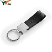Porte-clés en cuir de luxe avec logo personnalisé gravé en relief, fermé par métal