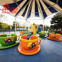 Grande manège tournante extérieure en forme de tasse à café pour parcs d'attractions et familles, capacité de 24 personnes, vitesse de 0,8 m/s