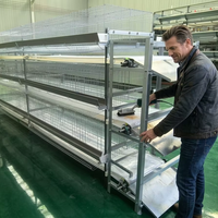 Cage à poules de type H avec système de nettoyage manuel du fumier par manivelle pour élevage avicole
