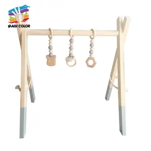 High quality kids early learning foldable wooden play gym with teething toys W08K177