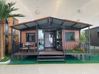 Maison conteneur en acier à panneaux sandwich, moderne, à double aile, extensible et pliable, économique, pour usage extérieur, hôtels et villas
