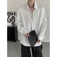 Chemise blanche décontractée pour homme, coupe ample, à rayures verticales, manches longues, avec laçage sur le devant, idéale pour le streetwear quotidien