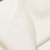 Tissu en jersey 100% polyester texturé gaufré, 215 GSM, tissu doux tricoté pour pulls et pantalons