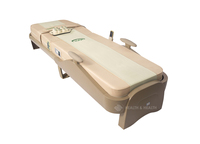 Lit de massage en jade thermique avec rouleau en jade naturel pour la maison et les centres de bien-être