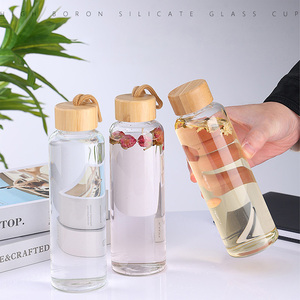 JM Top Vente <span class=keywords><strong>Promo</strong></span> Bouteille D'eau En Verre Haute Isolation Thermique Différents Types En Acier Inoxydable Matériel Bambou Couvercle Nouvel Usage Domestique - Product Image 5