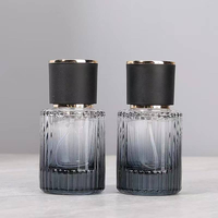 Flacon de parfum en verre à rayures verticales noir de luxe 50 ml avec bouchon rond et atomiseur, conteneur vide pour cosmétiques