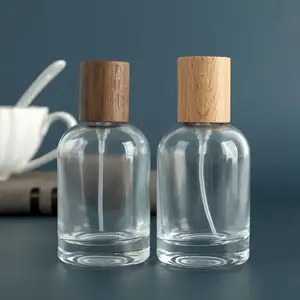 Nicht nachfüllbare Glas parfüm flasche 30ml Crimp flaschen spray Leere Klarglas 50 ml Parfüm flasche mit Holzdeckel