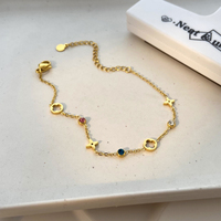 Bracelet à breloques en acier inoxydable plaqué or 18 carats, motif géométrique, fleur à quatre feuilles en zircon coloré, design tendance pour femme