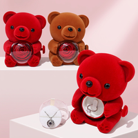 Nouveaux cadeaux pour la Fête des Mères : Boîte à bijoux rotative avec ours floqué et fleur préservée, idéale pour la Saint-Valentin, pour bagues et colliers