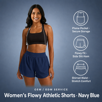 Shorts athlétiques fluides bleu marine pour femmes avec rangement sécurisé, coupe ample, ourlet fendu sur le côté, taille froncée, fabrication OEM ODM