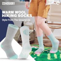 Chaussettes de ski et de randonnée en laine épaisse OEM pour l'hiver, haute qualité, anti-humidité, avec revers extensible, boucle en tissu éponge, coussinets intégraux, chaussettes thermiques de ski