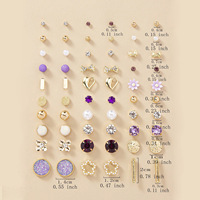 Venta caliente al por mayor nuevos 30 pares de pendientes diarios avanzados que combinan con todo combinación geométrica de perlas de flores moradas de moda para fiesta