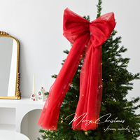 Grand nœud en tulle rouge pour le sommet de l'arbre de Noël, idéal pour les vitrines et la décoration festive