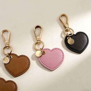 Wholesale Pu Leather Luxury Women Pendant Elegant Pretty Promotional Shaped Heart Keychain <b>Bag</b> <b>Charms</b> - Product Image 1