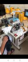 Machine à surjeter les bords de gants entièrement automatique programmable à point noué haute productivité avec moteur