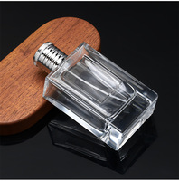 Vente en gros de flacons de parfum en verre rectangulaires plats avec pulvérisateur à pompe, plaque personnalisée avec marque et logo, 100 ml