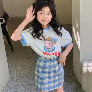 Kore çocuk giyim 2022 yaz yeni puf kısa kollu karikatür baskı T Shirt sevimli ekose etek 2 adet takım elbise genç kız giysileri