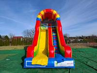 Château gonflable commercial sur le thème de la ferme avec toboggan pour parc d'attractions
