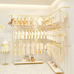 Negozio personalizzato di lusso per bambini boutique 3D design oro appendiabiti in acciaio inox montaggio a parete abbigliamento Rack per negozio - Product Image 1