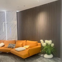 PVC WPC Revêtement mural en gros panneau de panneau cannelé solide pour la décoration intérieure