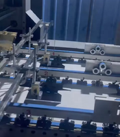Machine plieuse-colleuse entièrement automatique ORAY à grande vitesse pour boîtes en carton ondulé, avec correction de déviation et système de verrouillage de fond, pour usage intensif