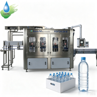 Machine de remplissage automatique de boissons par gravité à haute précision 300ml 500ml 1L 2L pour bouteilles transparentes