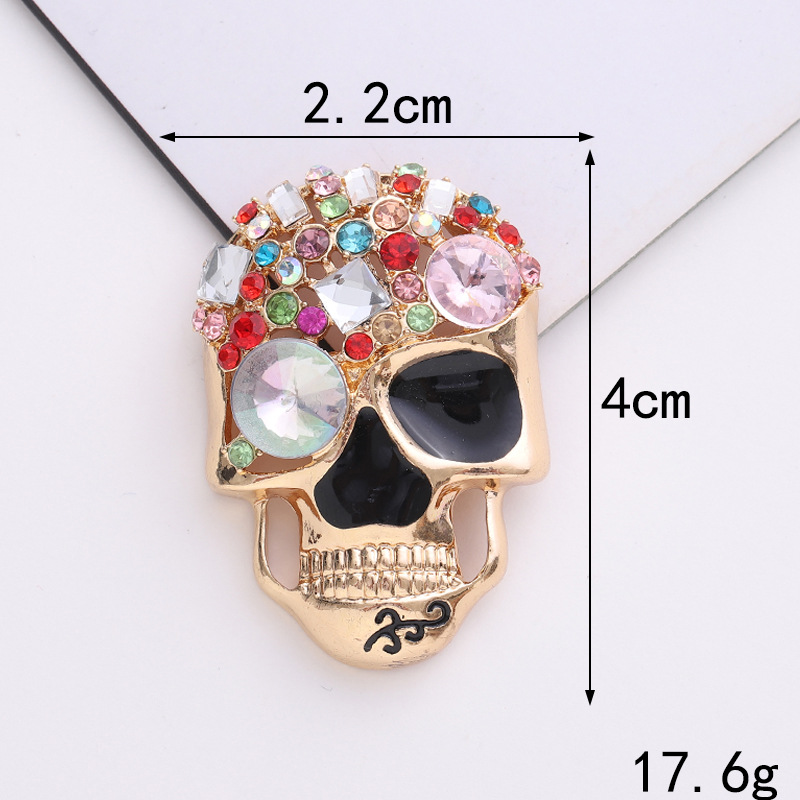 D2131 calavera de piedras preciosas (oro)