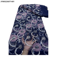 Tissu en dentelle de tulle brodé de fleurs et de perles pour robe de mariée