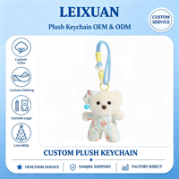 Mignon porte-clés en peluche ours blanc moelleux avec pyjama rayé et bonnet de nuit, cordon en paracorde bleu clair pour filles