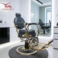 Chaise de barbier vintage de luxe, accoudoirs dorés décoratifs, cuir noir matelassé diamant, avec support hydraulique