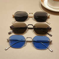 Lunettes de soleil unisexes sans monture, inspirées du métal, légèrement luxueuses, protection UV380, verres polarisés, mode transfrontalière